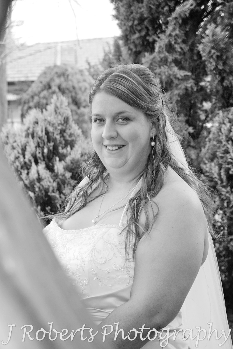 B&W bride smiling at the camera - wedding photography sydney